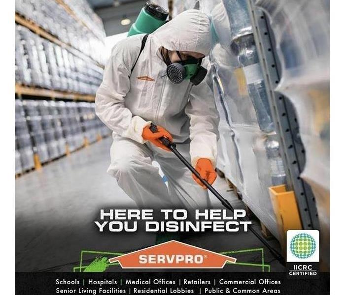 Servpro Technician Disinfecting Large Warehouse