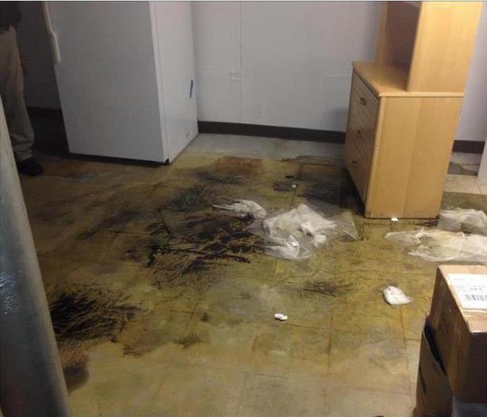 Sewage backup on the floor of a medical office