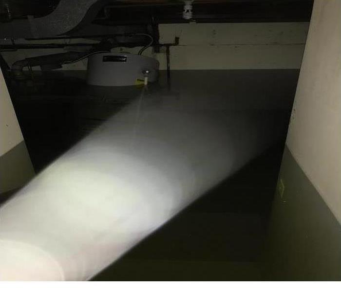 Flooded basement with carpet